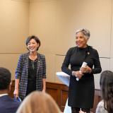 Joyce Beatty and Young Kim at a briefing